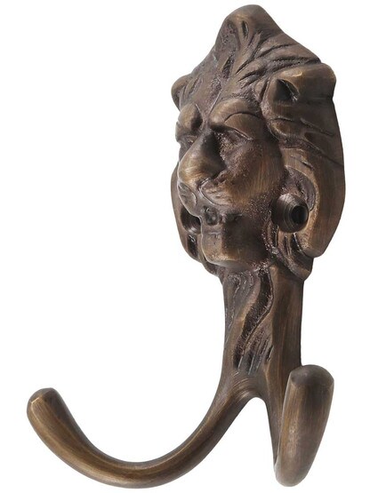 Solid Brass Lion-Head Coat Hook in Antique Brass.